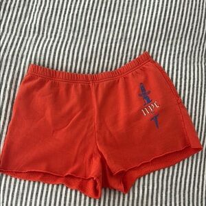 Spirit Jersey NYC sweat shorts orange butterfly detail “concrete jungle”